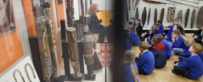 A group of school children sat learning about Aboriginal Australians